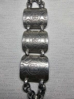 1930s Hammered Aluminum Aztec Warriors Bracelet